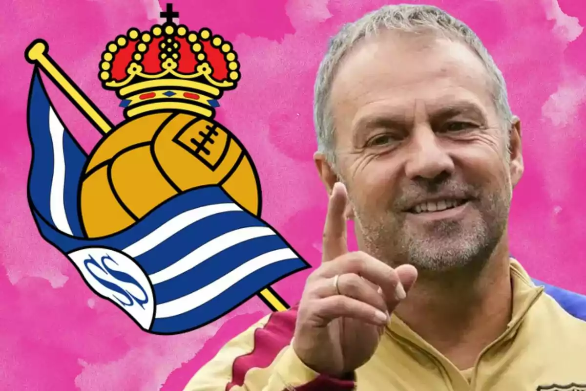 A smiling man points with his finger in front of a pink background, next to a soccer team's crest.