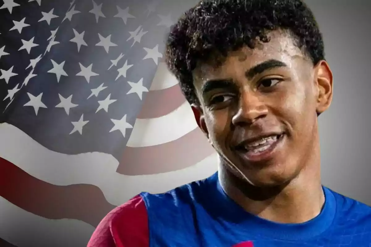 A young man in a sports jersey smiles in front of a waving American flag.