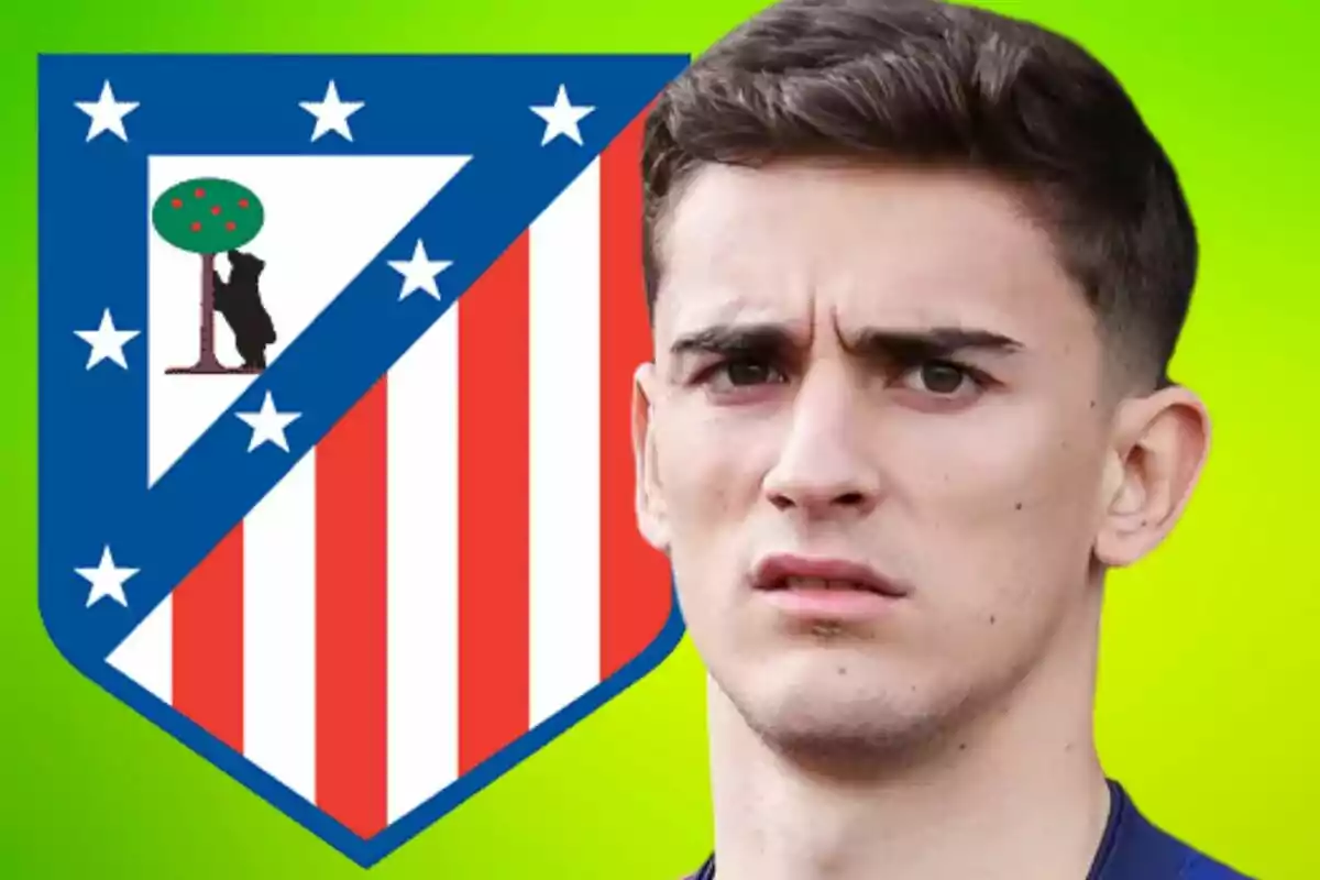 A man with a serious expression in front of the Atlético de Madrid crest on a green background.