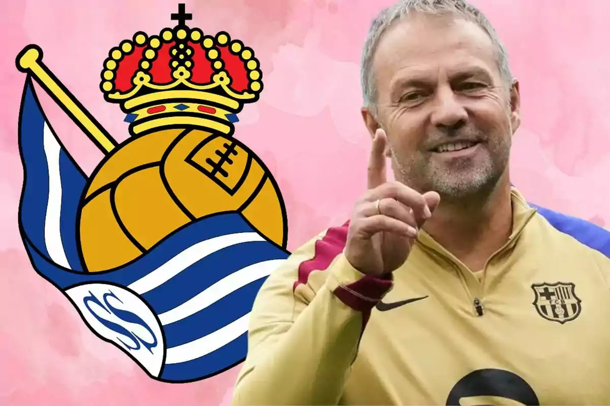 Un hombre sonriente con el dedo levantado, vistiendo una chaqueta deportiva con el escudo del FC Barcelona, junto al escudo de la Real Sociedad sobre un fondo rosa.