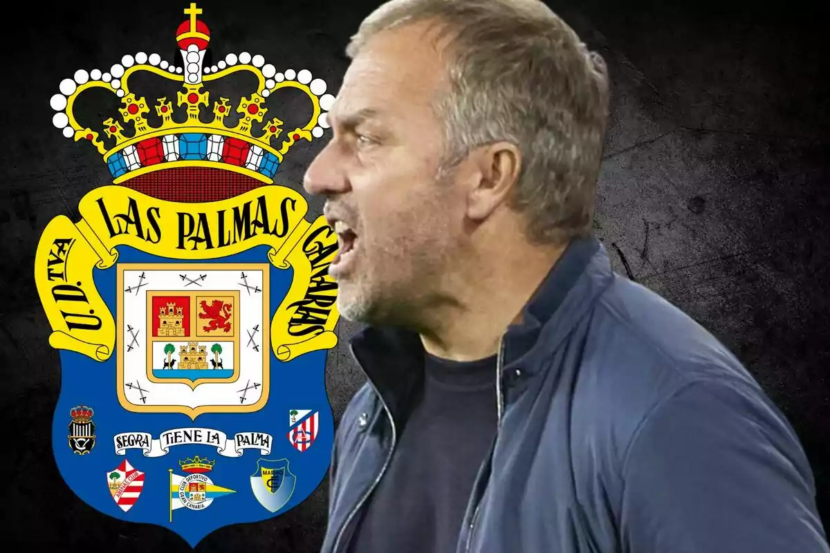 Hombre hablando frente al escudo de la UD Las Palmas.