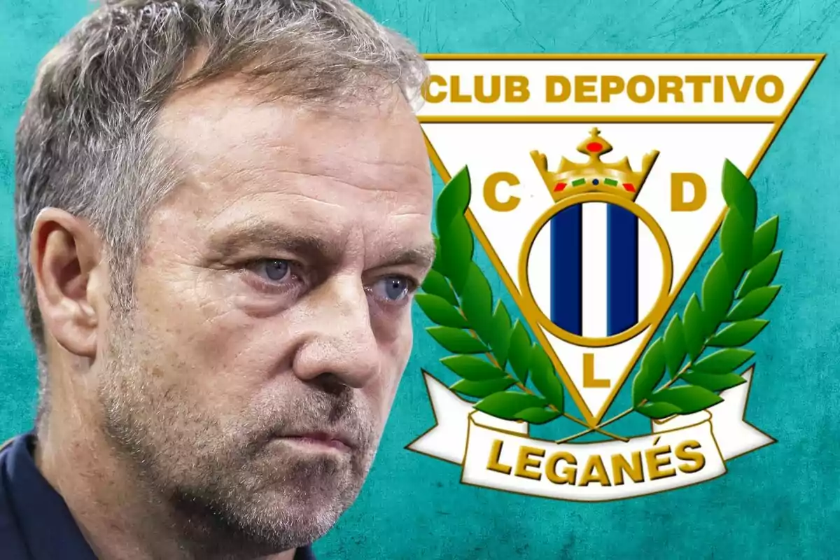 Un hombre con expresión seria frente al escudo del Club Deportivo Leganés.